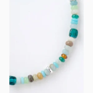 Close view of amazonite and handmade glass beads with irregular silver spacers
