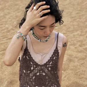 Amazonite necklace worn outdoors by the shore