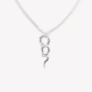 Close view of an infinity-shaped silver snake pendant with a clear cubic zirconia accent