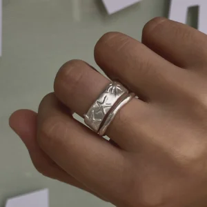 999 fine silver starfish band ring stacked with a slim organic silver ring