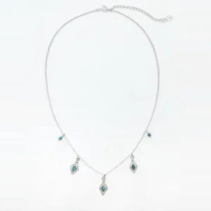Turquoise charm necklace in unplated S925 sterling silver with five dangling turquoise accents