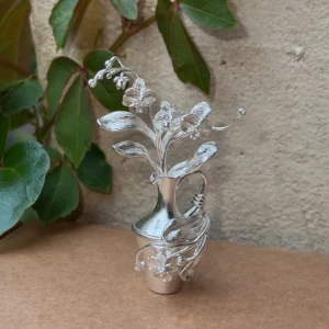 Two-stem phalaenopsis arrangement in a miniature 990 silver vase